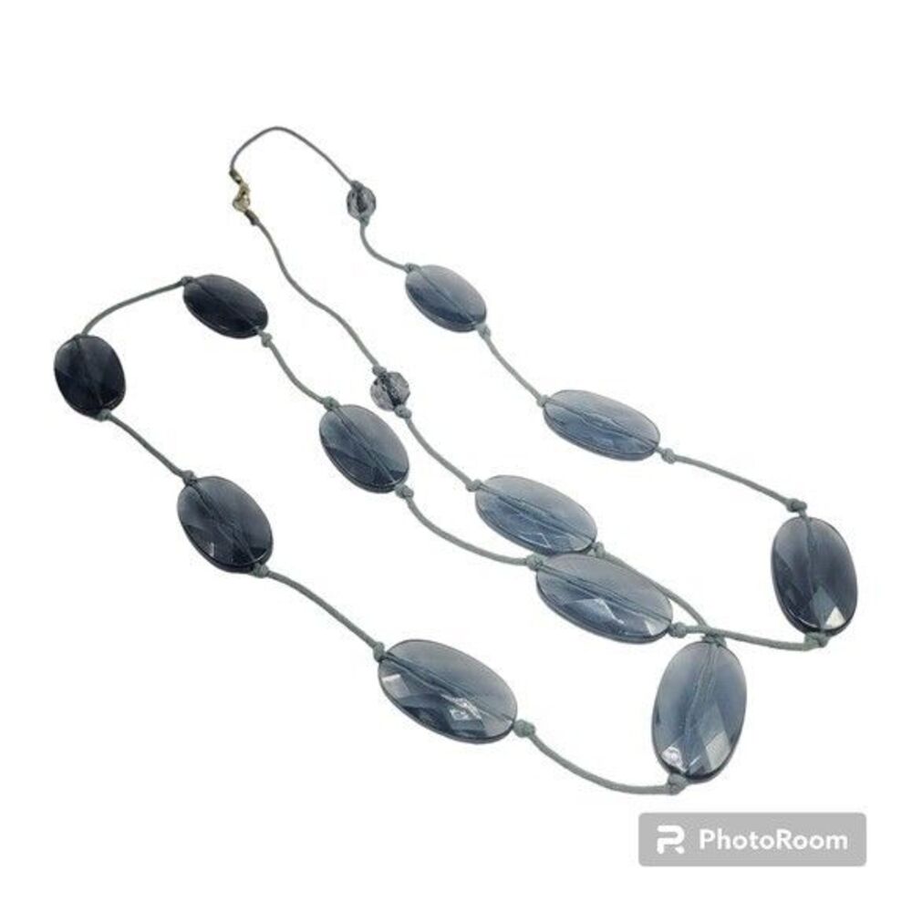 36" flat oval beaded necklace threaded together with a blue rope pull over